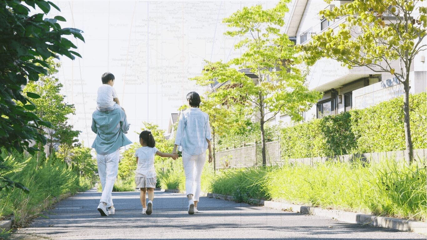 astrocartography map with planetary lines going across the world and a young family in a neighborhood walking down the street