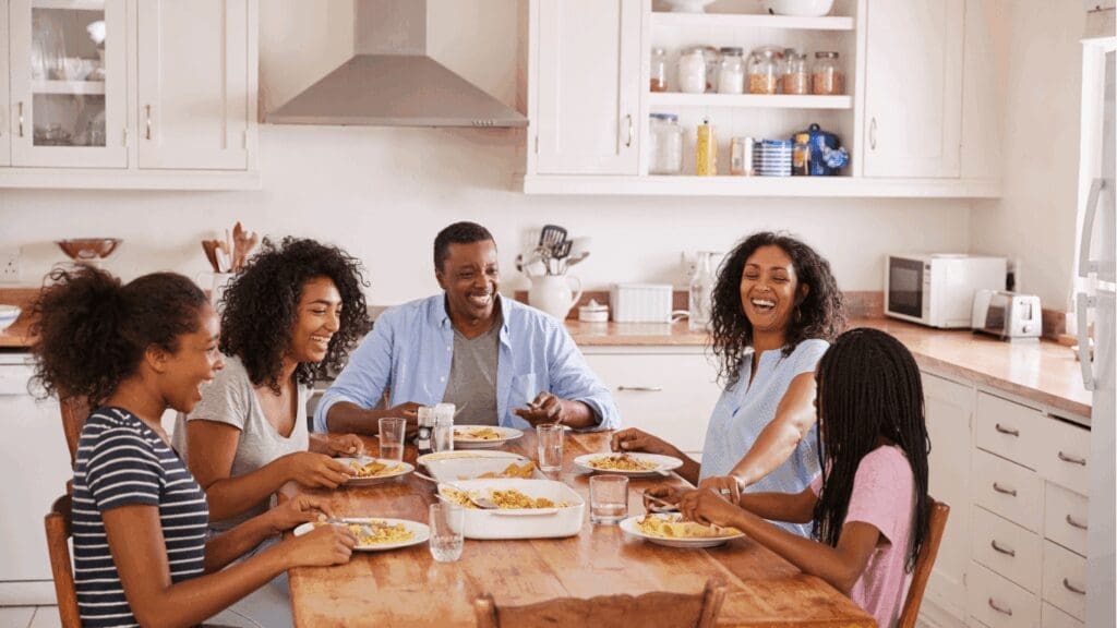 family having dinner at home representing Venus in the home