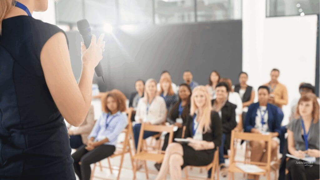 business woman speaking to trainees or employees representing Sun MC line