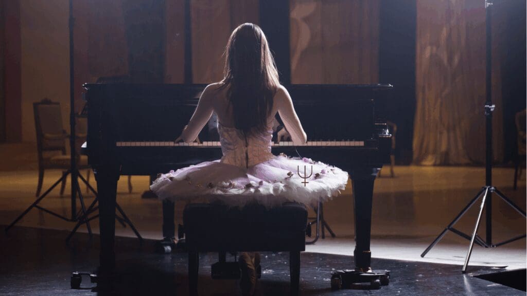 ballerina playing piano for Neptune lines that support musicians and artist