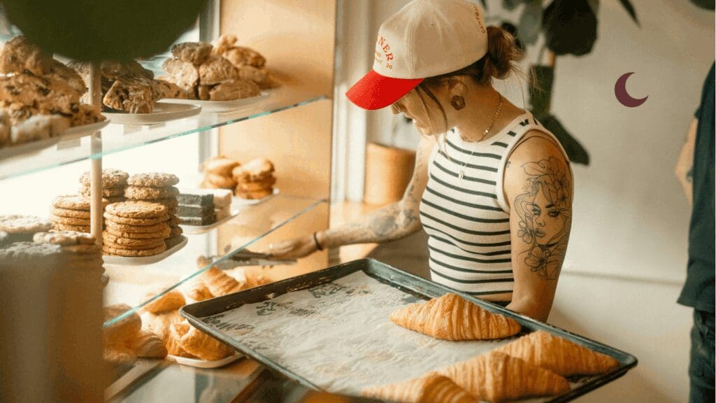 Woman at her bakery representing Moon lines good for home, land, food