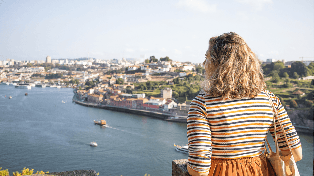 Digital nomad overlooking the city and river